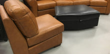 Load image into Gallery viewer, Conversational Curve all leather collection cognac or black. Storage ottoman