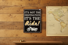 Load image into Gallery viewer, It's Not the Destination inspirational metal wall sign in rustic travel themed scene