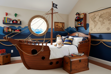 Load image into Gallery viewer, Baby Zoofari Hug Buddy Dog – Pirate Ship Bed Vignette
