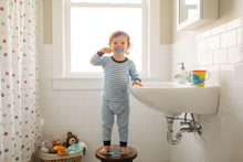 Load image into Gallery viewer, Baby Zoofari Raccoon Stool – Bathroom Lifestyle
