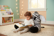 Load image into Gallery viewer, Child snuggled with Baby Zoofari Reading Buddy Zebra
