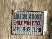 Load image into Gallery viewer, Life Is Too Short – Smile While You Still Have Teeth Funny Metal Wall Sign | Amazing Indoors
