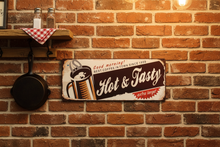 Load image into Gallery viewer, Hot and Tasty metal wall sign in rustic kitchen diner scene
